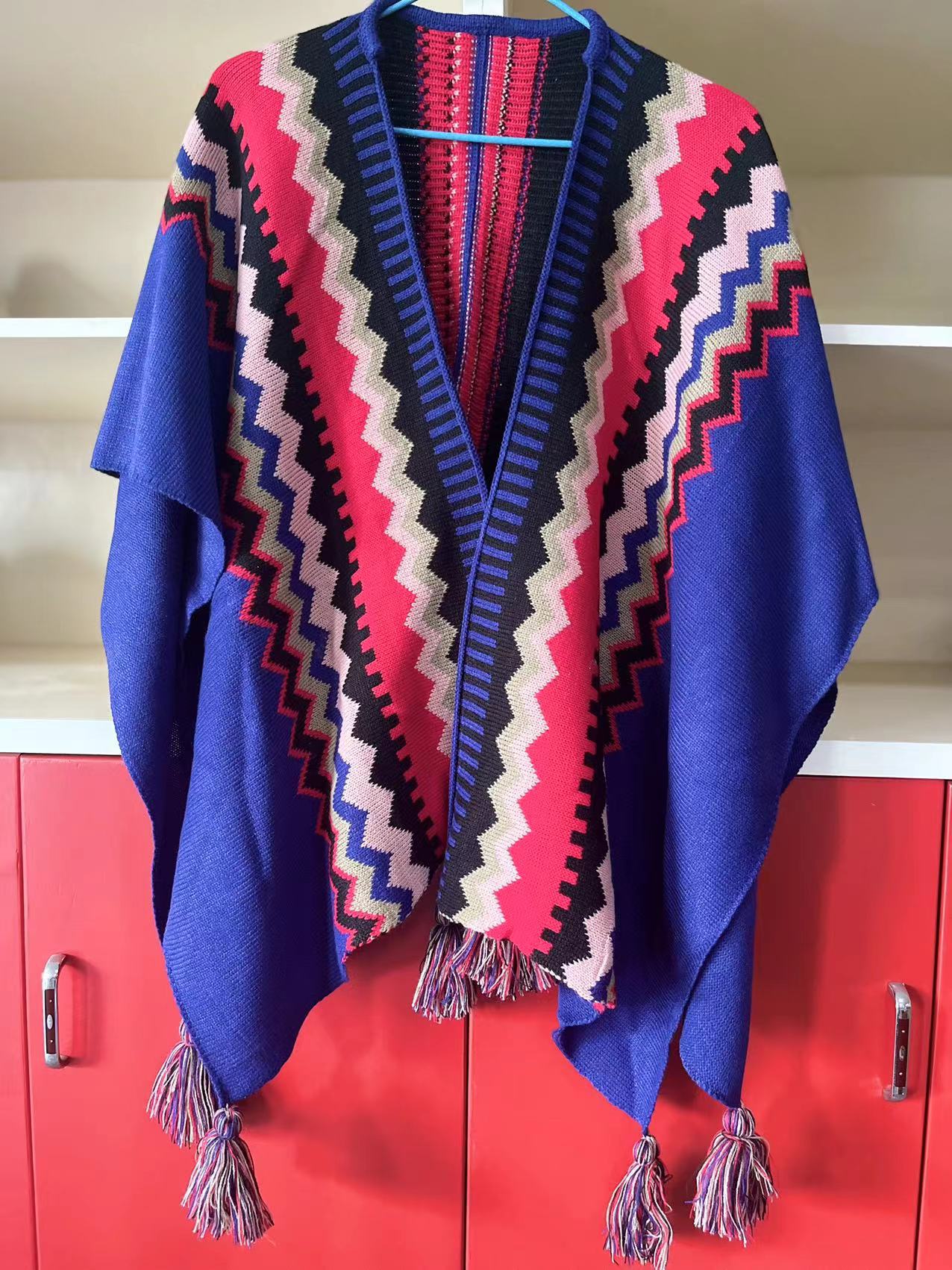 Bohemian Tassel Knit Cape – Free-Spirited & Stylish